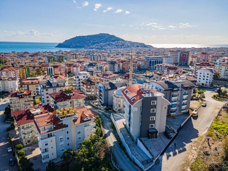 Duplex mit 4 Schlafzimmern in einem neuen Haus in Alanya - Photo 1