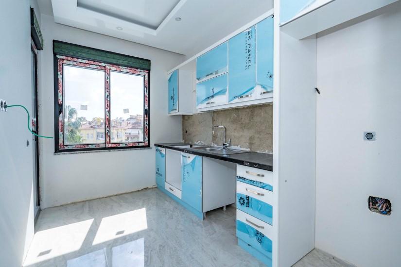 Neue 2+1 Wohnung in einer Luxusanlage im Zentrum von Alanya - Photo 18